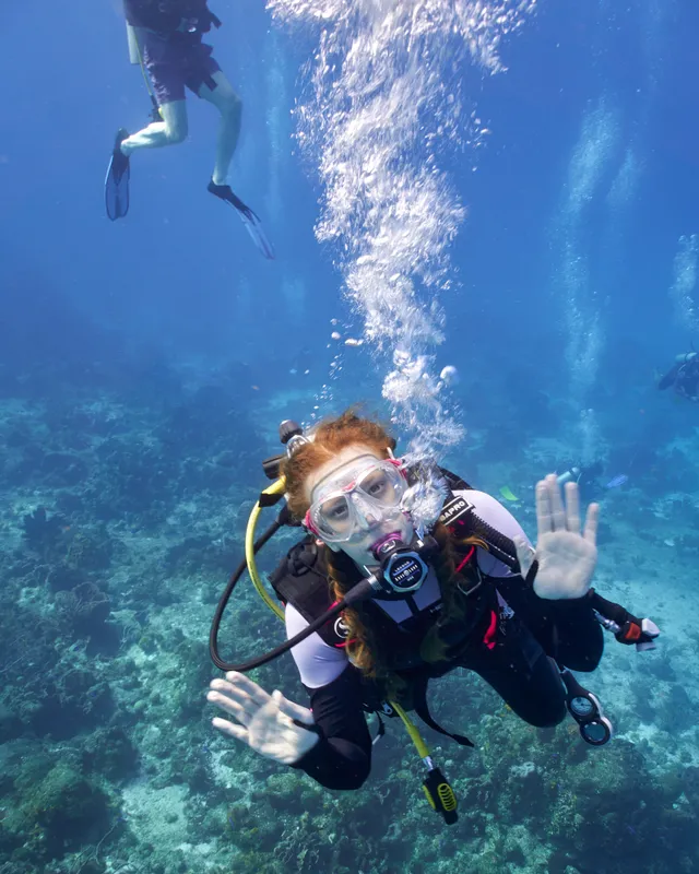 My wife waving at the camera