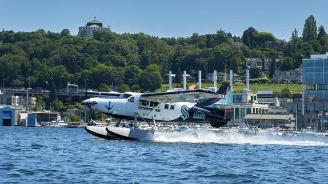 A Kenmore Air seaplane taking off